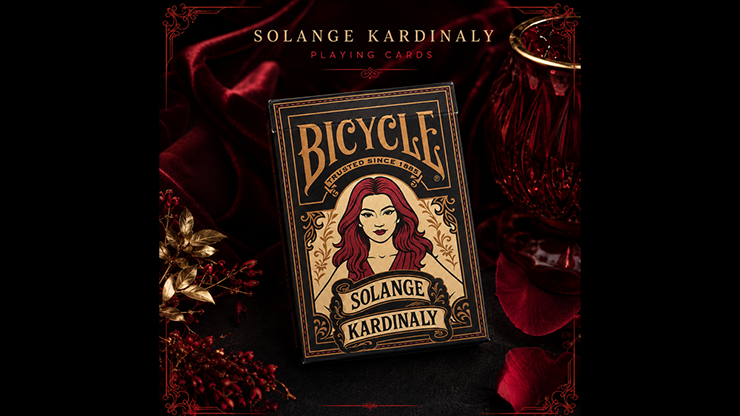 Solange Kardinaly Bicycle tuck box with gold lettering and an illustrated red-haired portrait against a dark red backdrop
