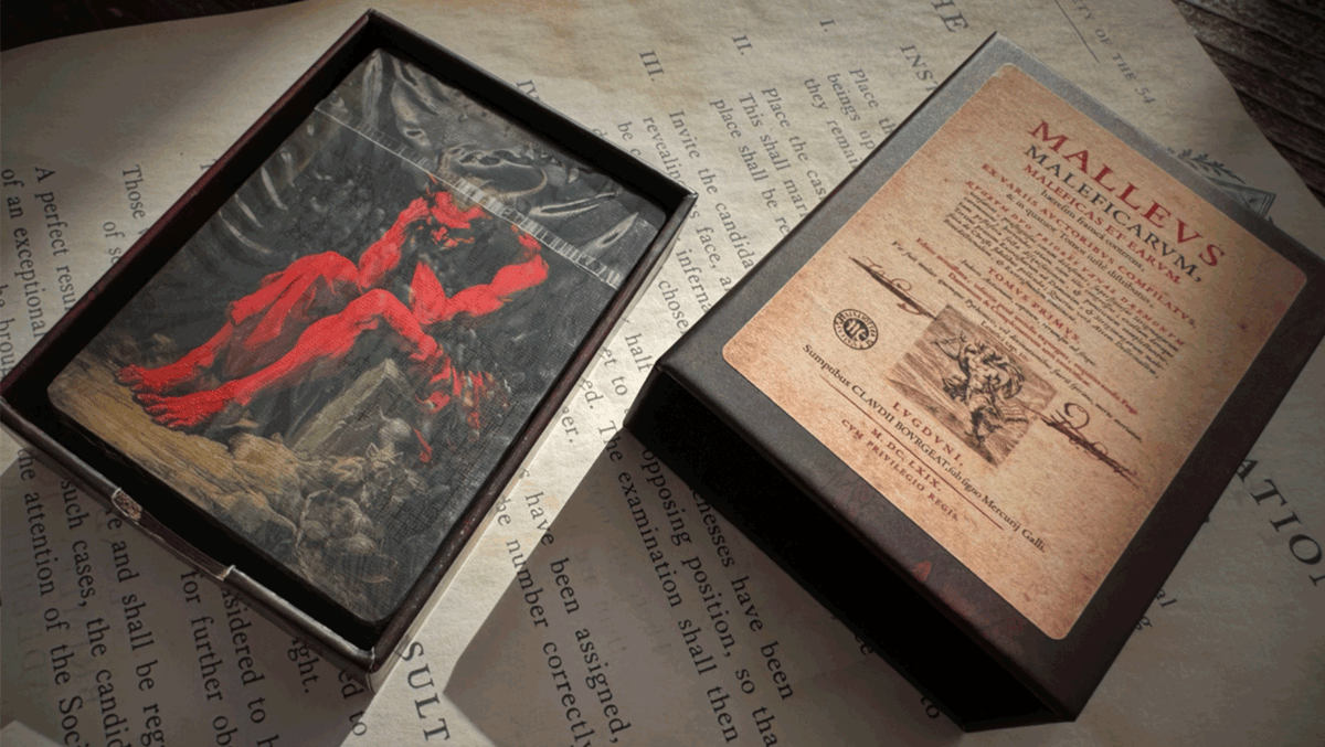 Angels & Demons Dominion boxed set with red demon artwork beside a vintage-style Malleus Maleficarum cover
